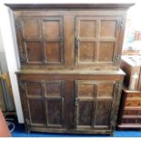 An 18thC. two piece English oak ham cupboard