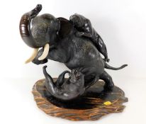 An early 20thC. Chinese bronze elephant & tiger gr