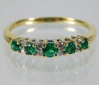 A 9ct gold emerald & diamond ring 2.3g size S