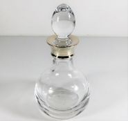A small Carrs silver rimmed crystal decanter 7.75i