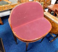 A 19thC. mahogany card table with turned legs 35.5