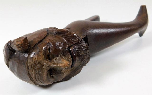 An antique Victorian carved nutcracker of old man