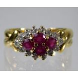 An 18ct gold ring set with ruby & 0.25ct diamond 3