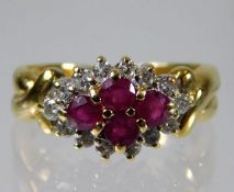 An 18ct gold ring set with ruby & 0.25ct diamond 3