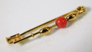 An 18ct gold antique style brooch set with coral 1