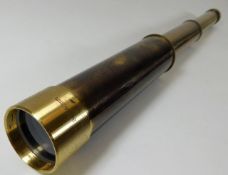 A brass extendable telescope 17.75in