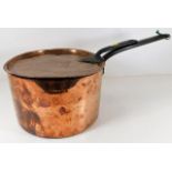 An early 19thC. copper pan & lid