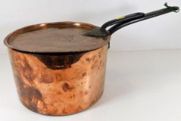 An early 19thC. copper pan & lid