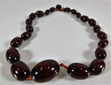 A set of "cherry amber" style beads 48.9g