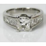 A platinum ring set with 1.07ct centre diamond wit