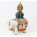 A Meissen D.R.G.M porcelain Chinese style elephant