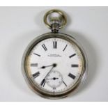 A silver Waltham pocket watch