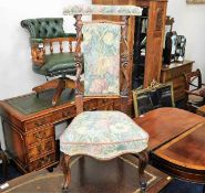 An upholstered 19thC. rosewood prix dieu chair 37i