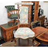 An upholstered 19thC. rosewood prix dieu chair 37i