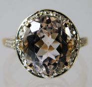 A 10ct gold morganite & diamond cluster ring 3.5g