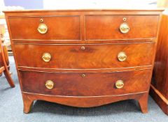 A low level Regency period mahogany chest of drawe