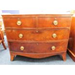 A low level Regency period mahogany chest of drawe