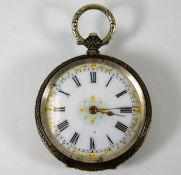 A small silver pocket watch with enamel face