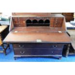 A 19thC. mahogany bureau, some faults