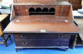 A 19thC. mahogany bureau, some faults