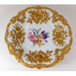 A large 1920's Meissen plate with gilded relief de