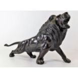 A bronze figure of lion roaring 13.5in long