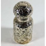 An embossed silver scent bottle, split to silver o