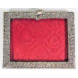 An embossed silver photo frame 8.75in x 7in