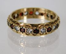 A yellow metal eternity ring, tests as 9ct gold, s