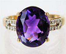 A 9ct gold ring set with amethyst & diamond 2.3g s