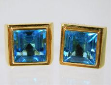 A pair 18ct gold blue topaz earrings 15.6g