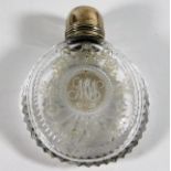 A 19thC. cut glass scent bottle with white metal t