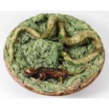 A Portuguese continental majolica dish with snake