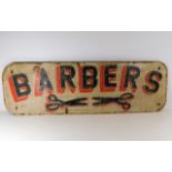 A painted vintage style Barber's sign