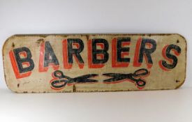 A painted vintage style Barber's sign
