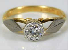 An 18ct gold solitaire ring set with 0.58ct diamon