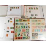 Four stamp albums including Hungary & Eastern Euro