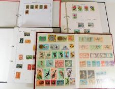 Four stamp albums including Hungary & Eastern Euro