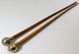 A silver topped malacca cane swagger stick twinned