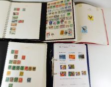Five stamp albums including New Zealand & World