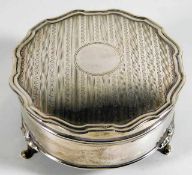 A small silver footed jewellery box by A & J Zimme