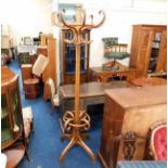 A large bentwood coat & stick stand with rotating