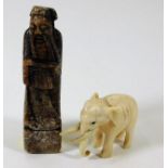 A Chinese soapstone chess piece twinned with a ant