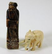 A Chinese soapstone chess piece twinned with a ant