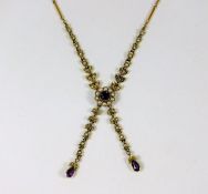 An antique 9ct gold necklace set with amethyst & p