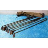 Eight hickory golf clubs including two woods