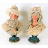 A pair of German porcelain busts, possibly Dresden