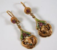A pair of yellow metal & enamel earrings set with