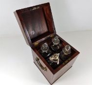 A Georgian mahogany decanter box with four decante