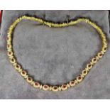 A 14ct gold necklace set with approx. 10ct diamond